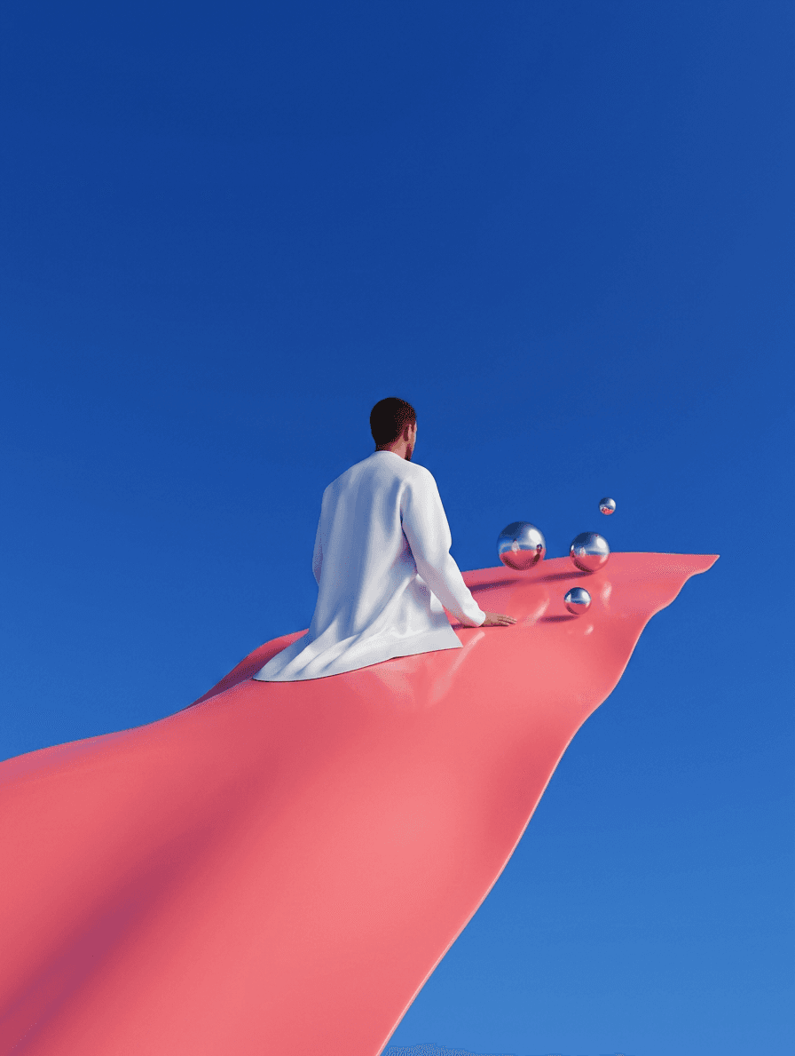 A man sitting on a pink sheet with a blue sky background, featuring glossy surfaces and reflective spheres.