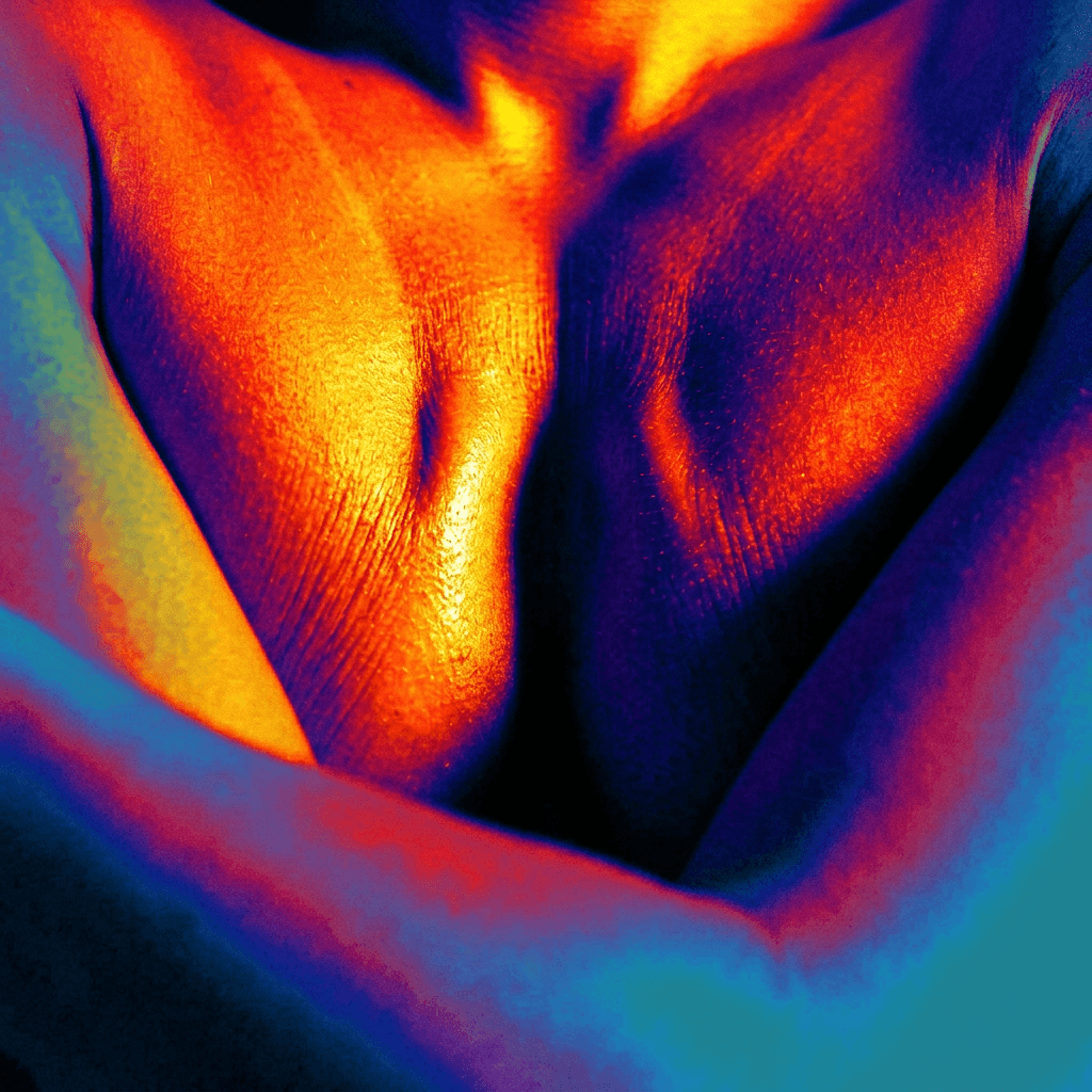 Close-up of a torso embraced by arms with orange and blue gradients.