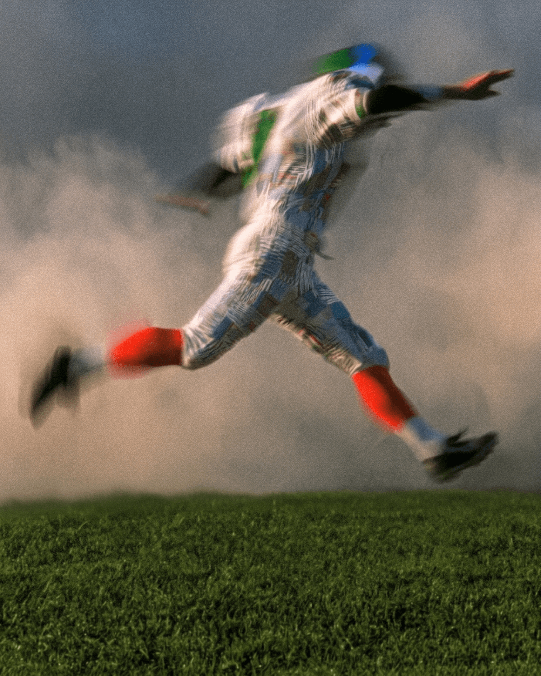 A player captured mid-leap in a colourful and dynamic style.