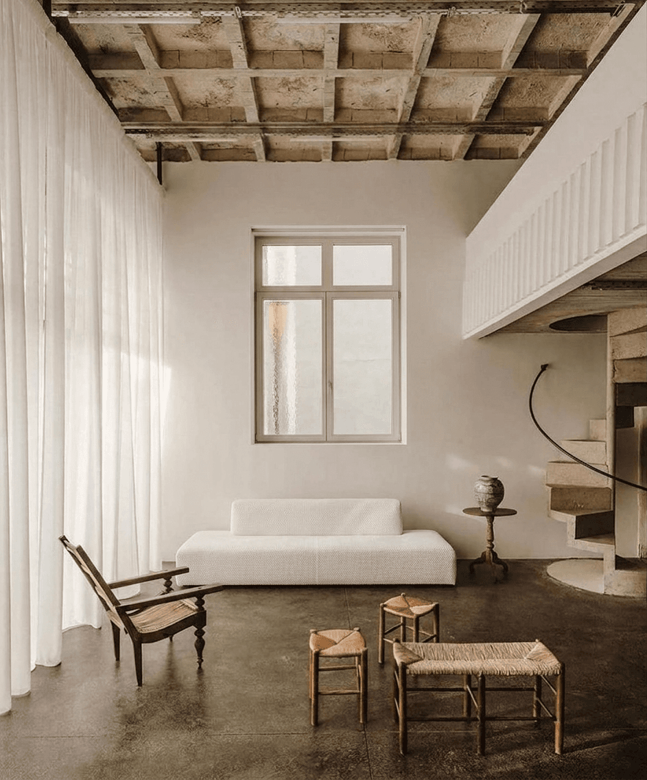 Interior scene with minimalistic furniture and soft neutral tones.