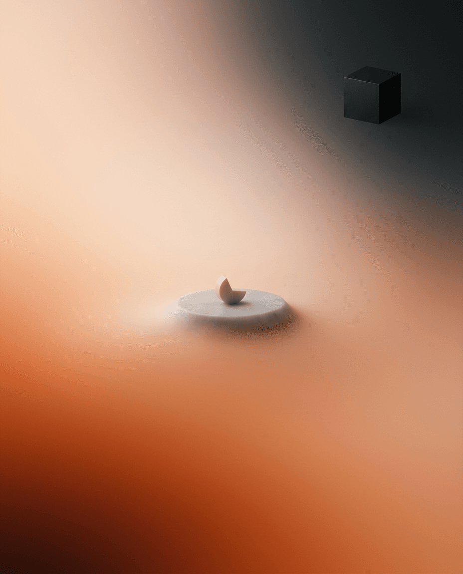 Rounded stone on a circular surface with a dark cube behind it.