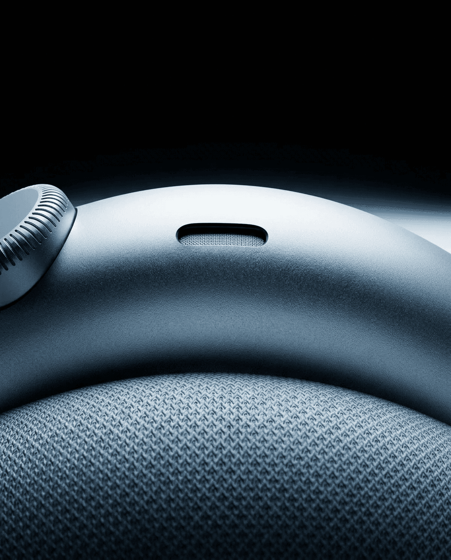 Close-up of a modern device highlighting metallic textures and minimalist buttons.