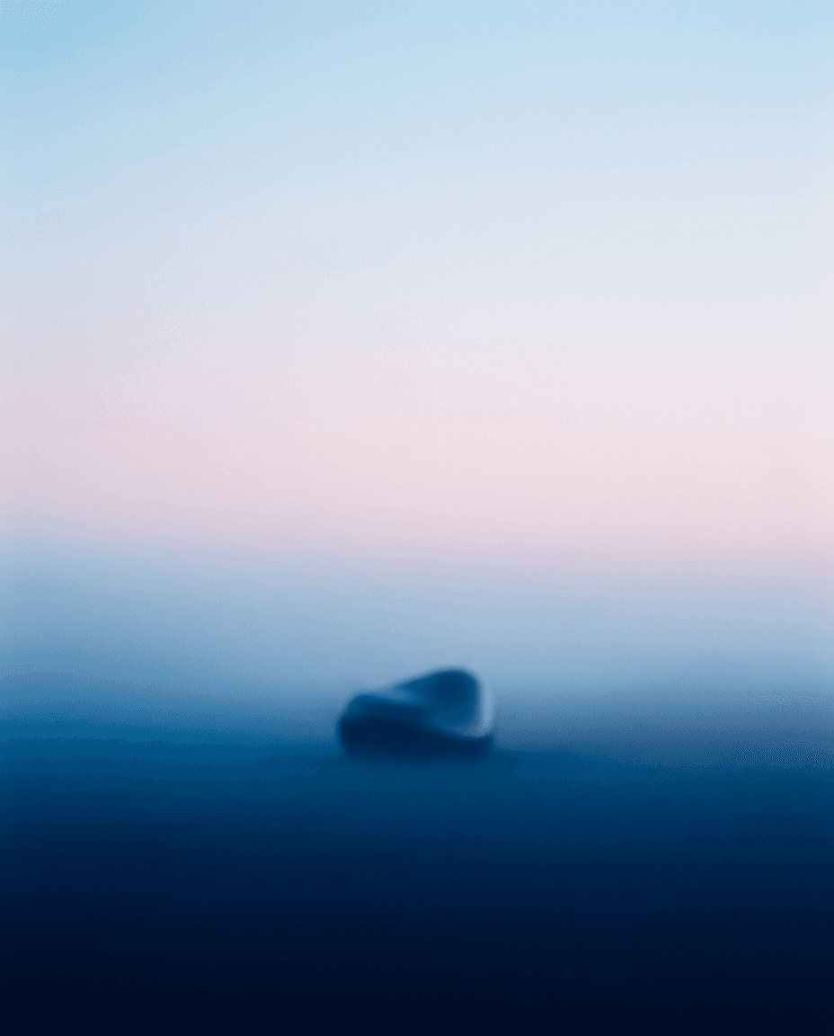 An abstract shape against a blurred pastel gradient of blues and pinks.