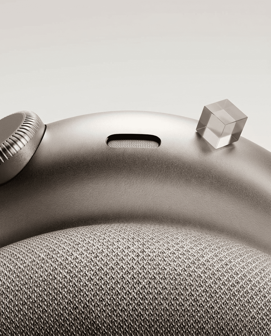 Close-up of a modern smartwatch with a metallic finish and fabric band.