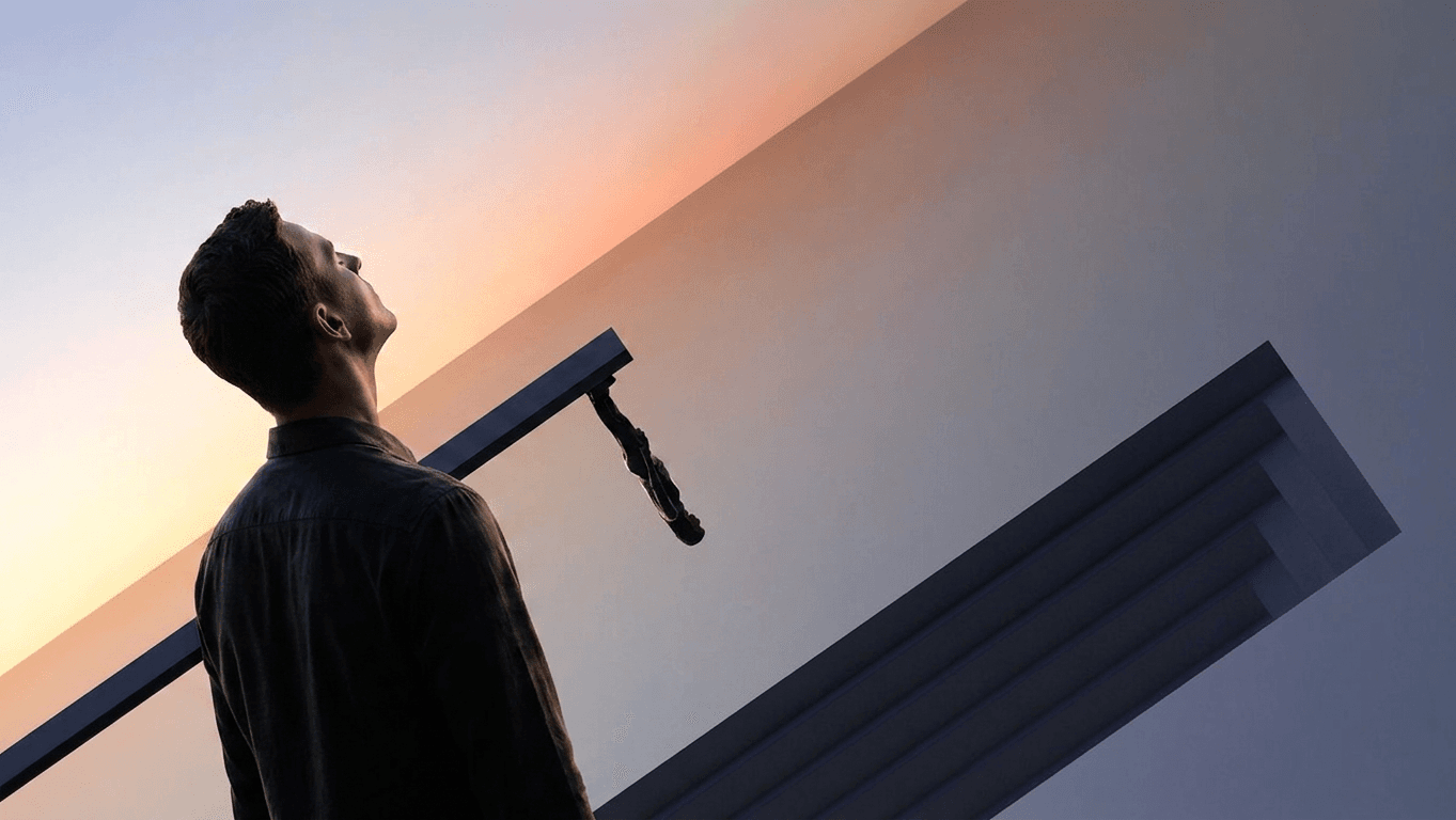 A figure gazes upward at a gradient sky in soft pastel colours.