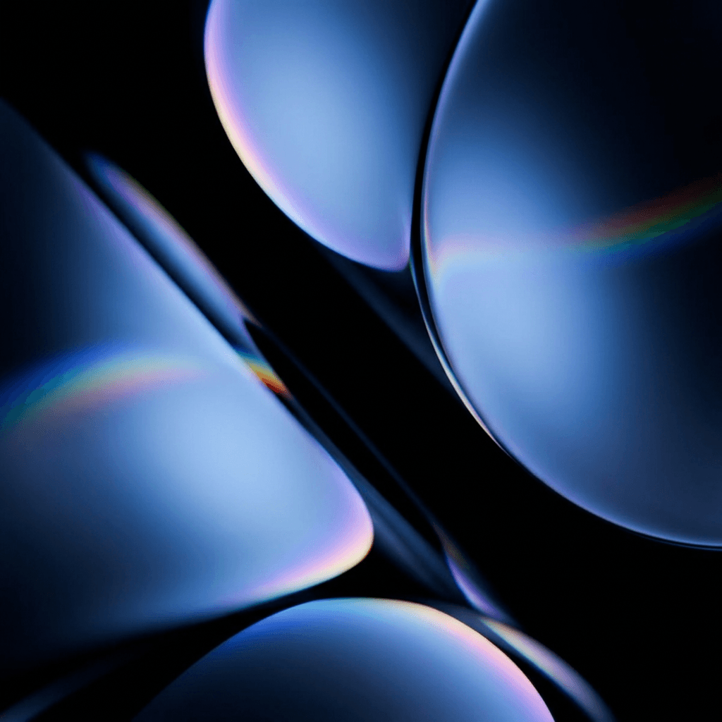 Abstract illustration with rounded forms and rainbows on a dark backdrop.