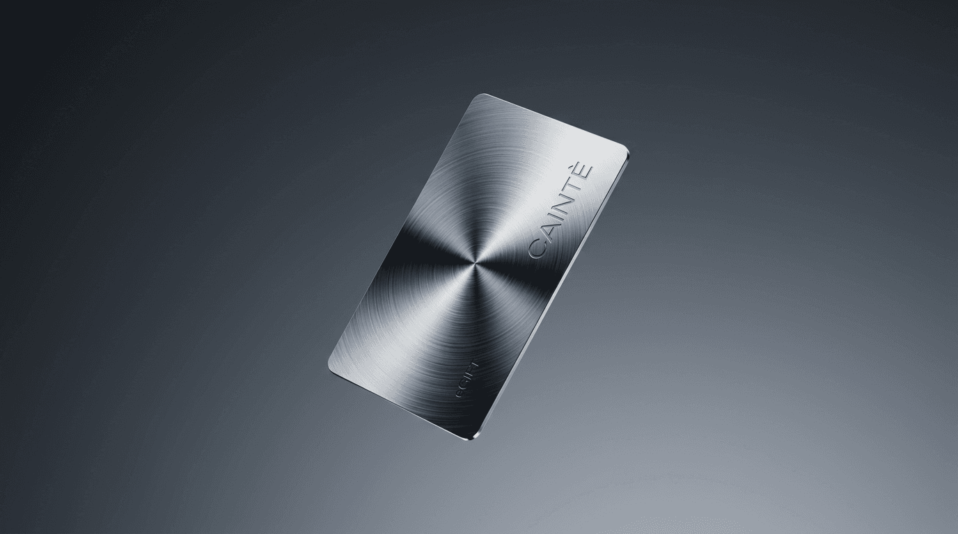 A metallic credit card with a brushed texture and silvery tones.