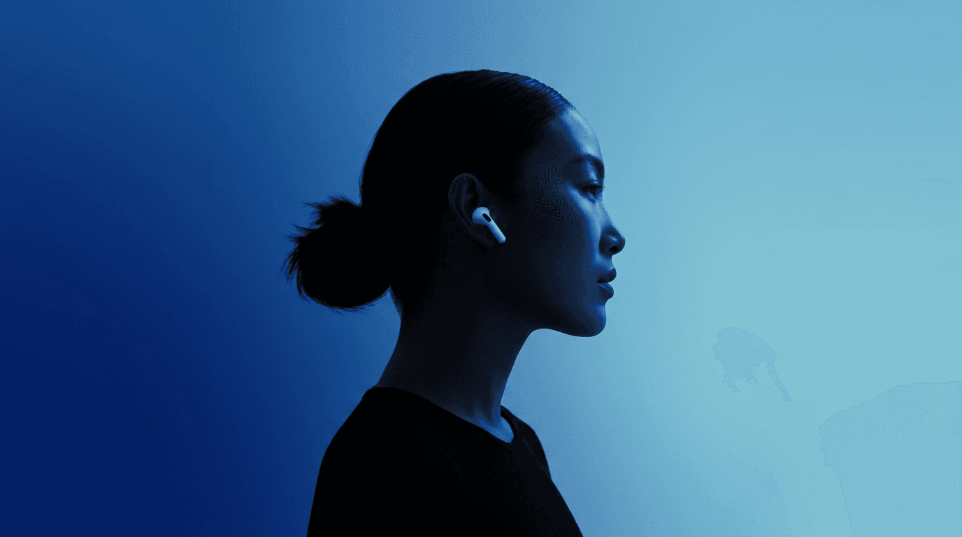 Profile of a woman wearing AirPods with a deep blue gradient background.