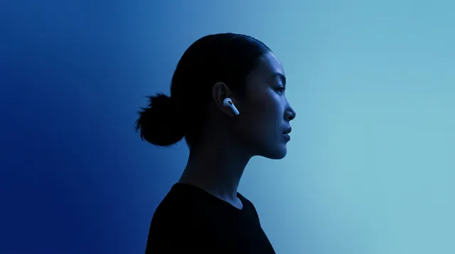 Profile of a woman wearing AirPods with a deep blue gradient background.