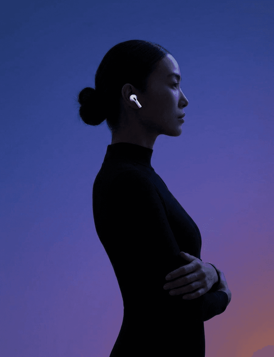 Profile silhouette of a woman in black with wireless earbuds against a gradient background.