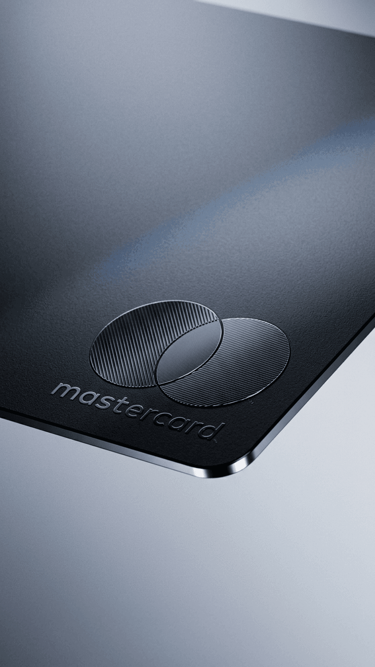 Close-up of a sleek Mastercard credit card with a matte finish.