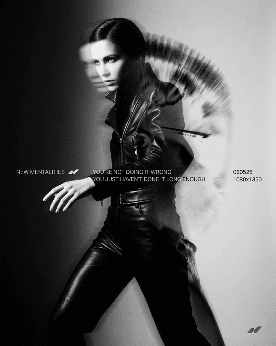Black-and-white illustration of a confident woman in a leather outfit with abstract designs.