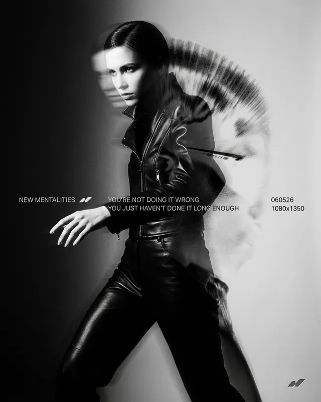 Black-and-white illustration of a confident woman in a leather outfit with abstract designs.
