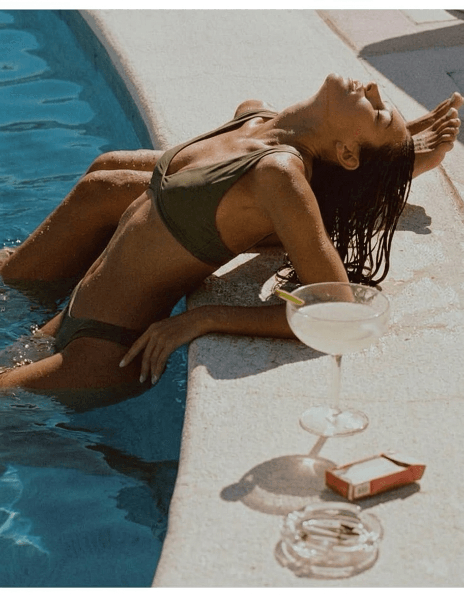 Woman in an olive bikini relaxing by the pool with green and sandy tones.