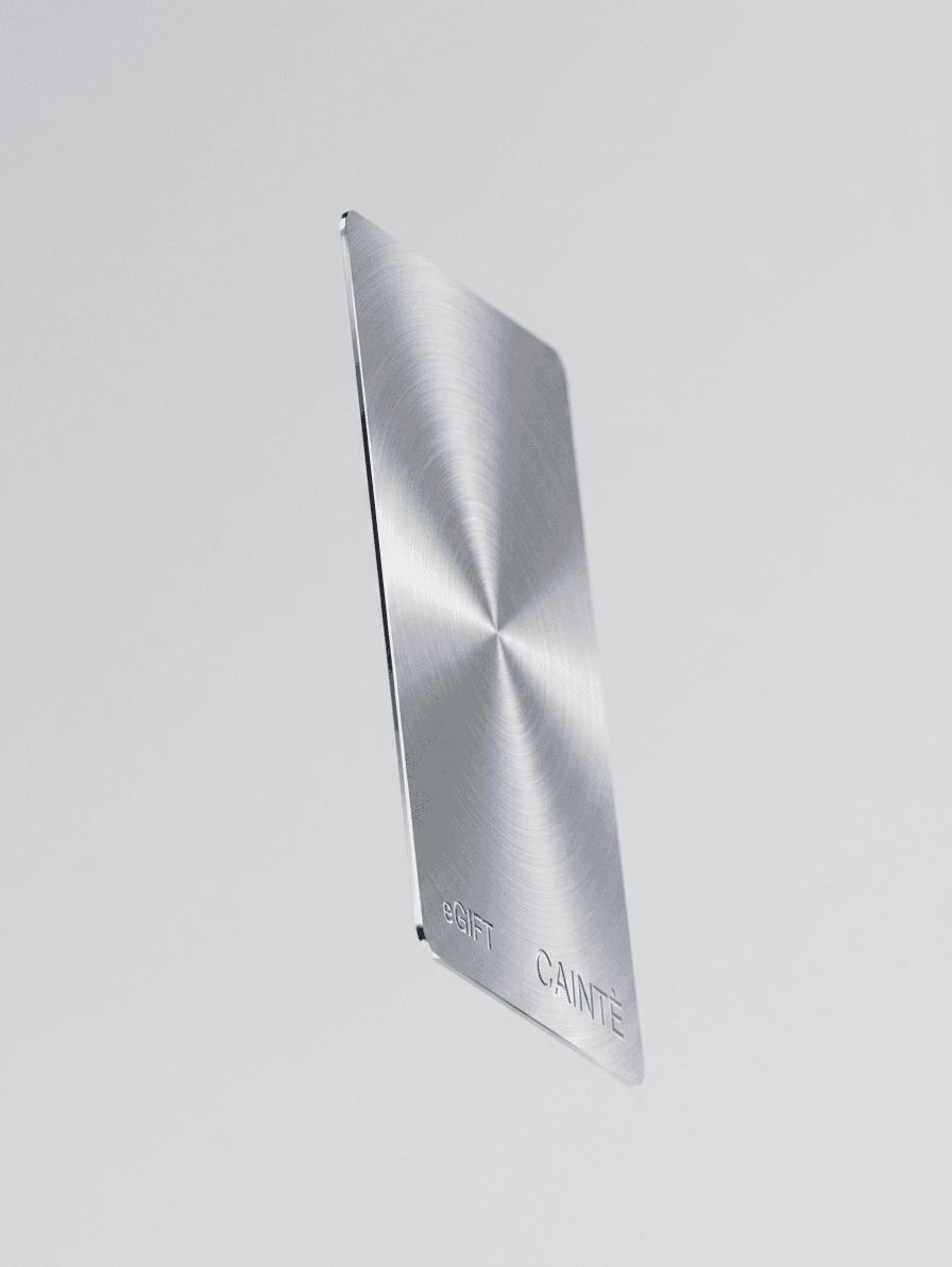 A metallic card with a brushed finish floating on a white background.