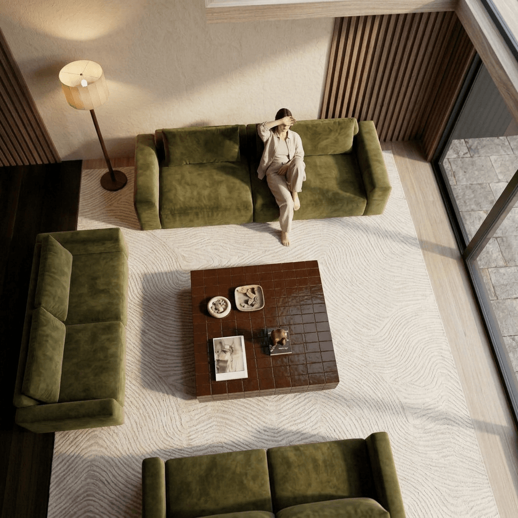 Minimalist living room with olive green sofas and a beige rug.