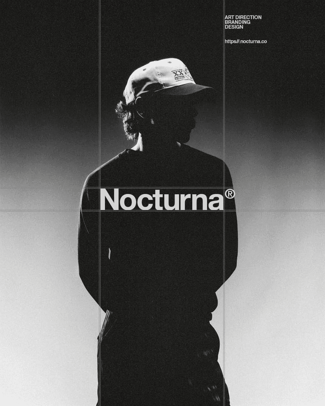 A minimalist black-and-white editorial photograph features a silhouetted figure wearing a cap, exuding a moody